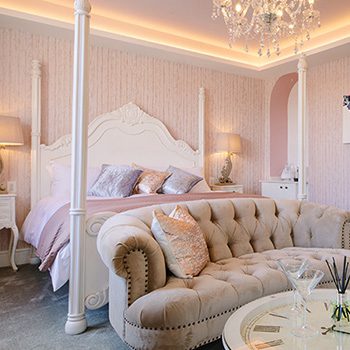 Four poster bed in The Parisian Suite at Absoluxe Suites, Kirkby Lonsdale